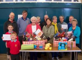 Some of the lucky winners from the Rotary Club Duck Race held at the Dunblane Fling receiving their prizes.
	(left to right) Matthew, Lucy and Steve Smith, with Rotarian Peter Holmes, Aileen Martin, Helen and Gordon McKenzie, Dawn Green, Cathy Wilson